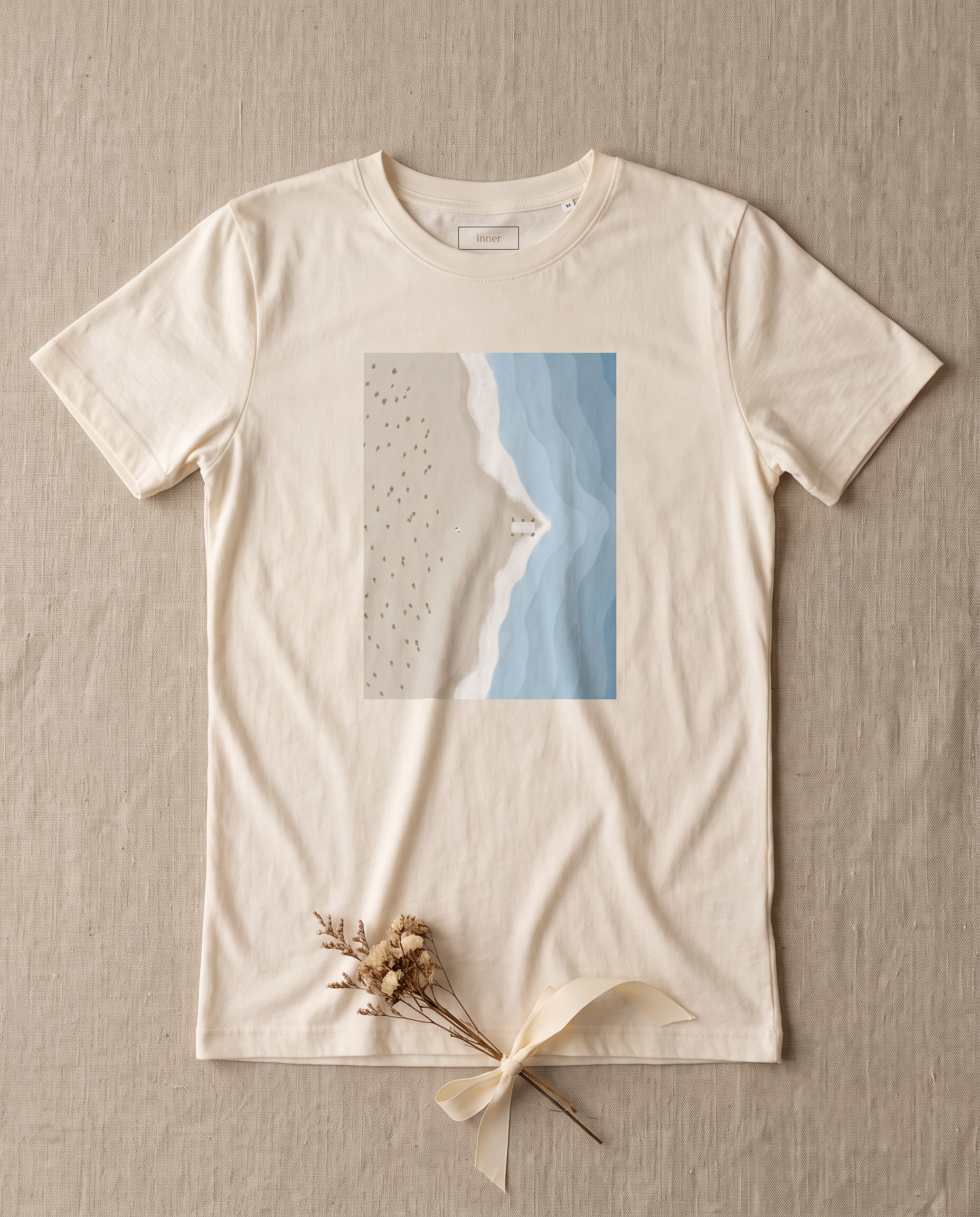 Opening the Sea Tee flatlay